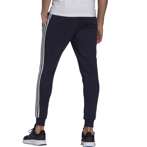 Spodnie męskie adidas Essentials Slim 3 Stripes Pants granatowe GM1090 Adidas